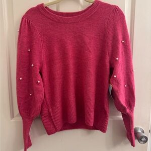 Pink sweater with pearl detail